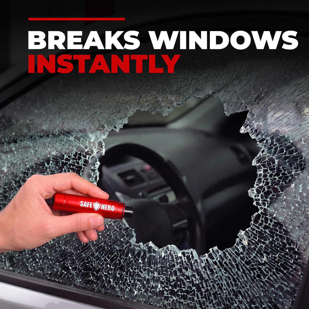 Hand breaking a tempered car side window with the red Safe Hero Flash Hammer